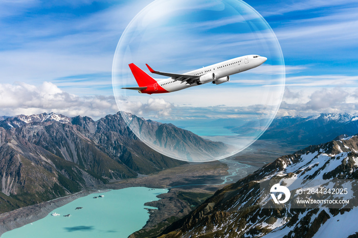 Travel bubble concept - Airplane traveling in bubble representing international travel bubble project to revive tourism and hotel industry among countries that show good control of covid 19 spreading.