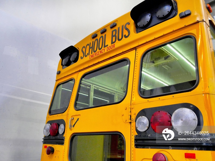 American school bus back door view on blank space