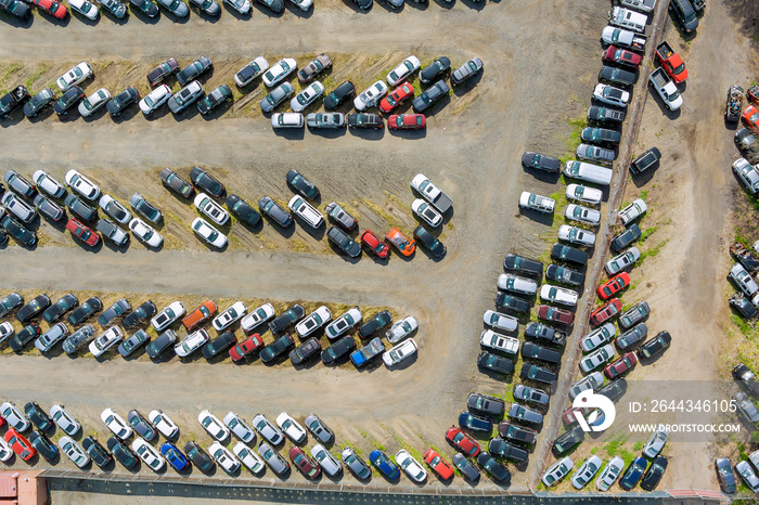 Many used cars parking auction lot terminal parked a rows