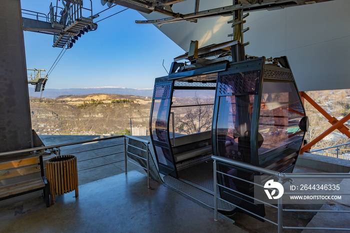 Modern cable car on the upper station of the city