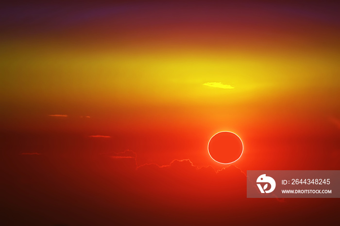 amazing phenomenon of total sun eclipse over cloud sunset orange sky