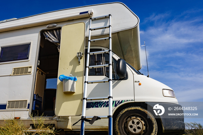 Caravan with ladder. Camper equipment.