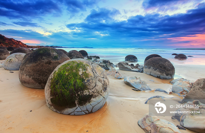 Cloudy Sunrise at Moeraki Boulders, New Zealand