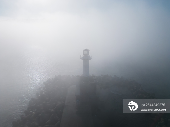 Lighthouse in a foggy sea. Varna, Bulgaria