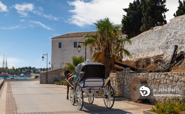 Horse drawn carts, used as taxis on the Greek island of Spetses, Greece, Europe