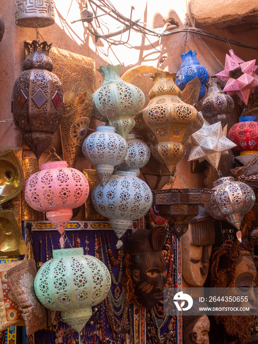 Moroccan style hanging lamps in the medina traditional market. Lights and souvenir shops Marrakech