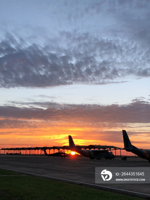 plane landing at sunset