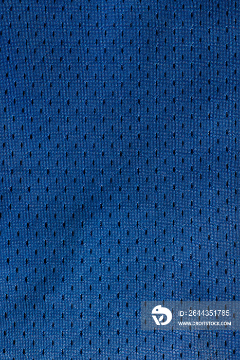 Sport Clothing Fabric Texture Background. Top View of Cloth Textile Surface. Blue football shorts. Copy Space. Seamless perforated mesh pattern material