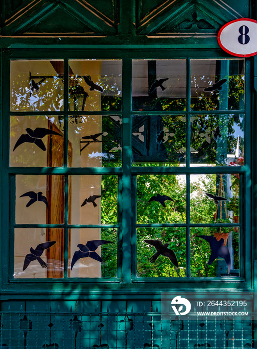 Wooden patio with bird symbols