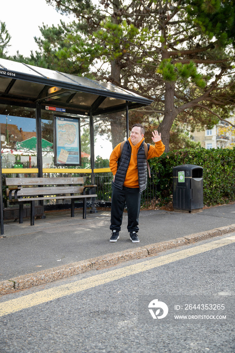 Man waiting at bus stop