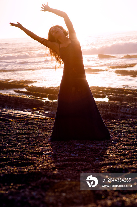 Ecstatic Sunset Dancer By The Sea