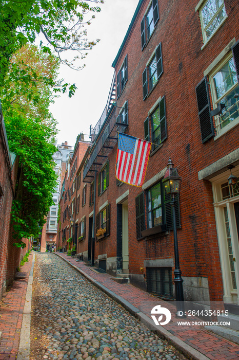 Acorn Street with cobblestone and historic row houses on Beacon Hill in historic city center of Boston, Massachusetts MA, USA.