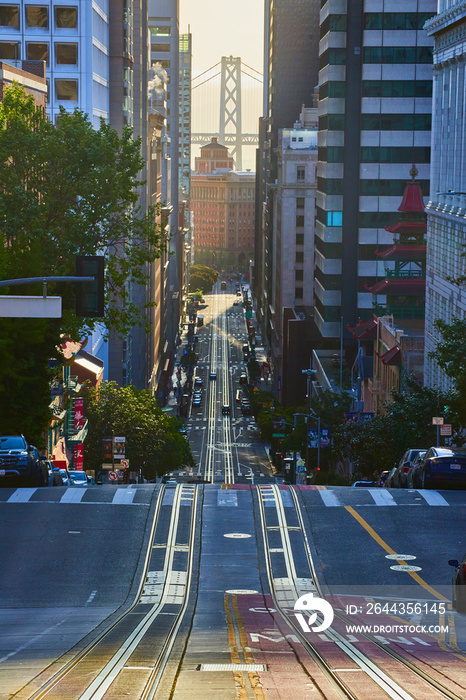 Empty trolley tracks go towards Oakland Bay Bridge in downtown San Francisco morning