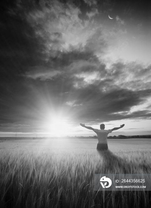 Man in a field. Black and white