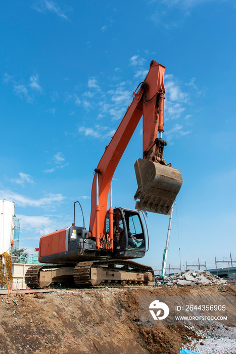 Excavator digging the ground: civil engineering work