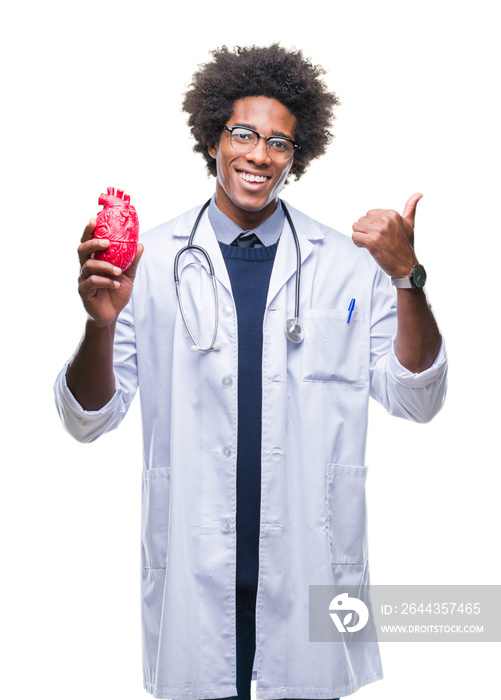 Afro american cardiologist doctor man over isolated background pointing and showing with thumb up to the side with happy face smiling