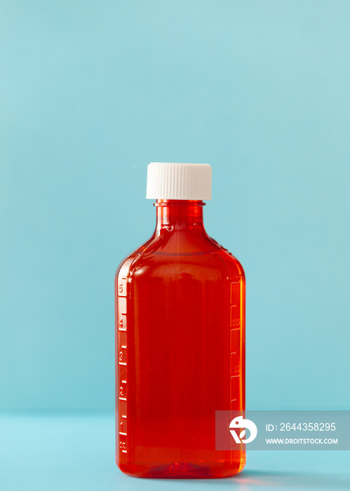 cough syrup medicine orange bottle