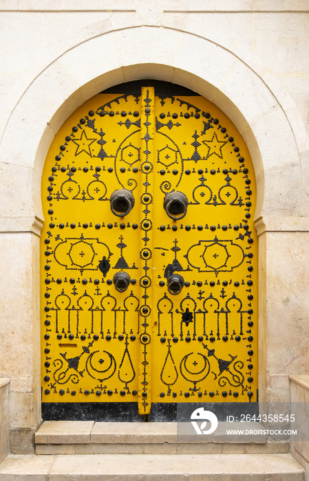 Typical yellow gate in Tunisia