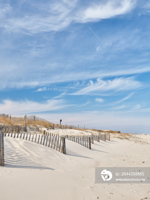 New Jersey Island Beach state park attempts to protect the massive and endangered sand dunes from wind and wave erosion, as well as human foot traffic with these wooden slat storm fencing