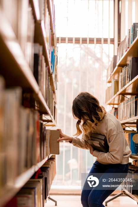 Girl taking a book