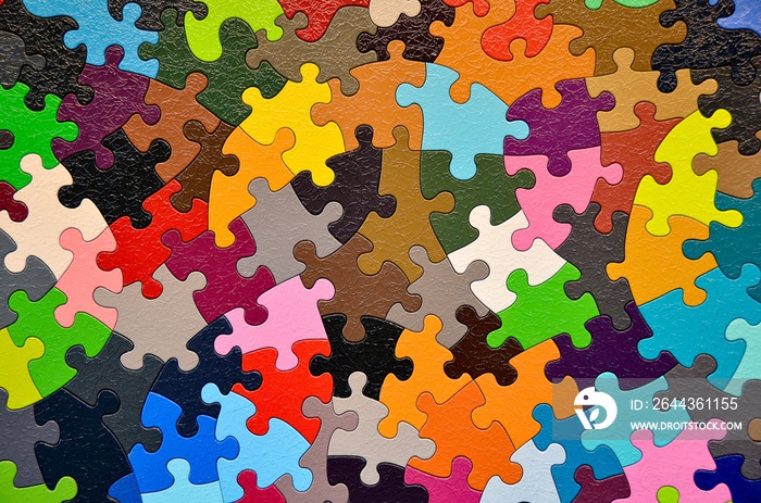 close up of colorful jigsaw puzzle pieces