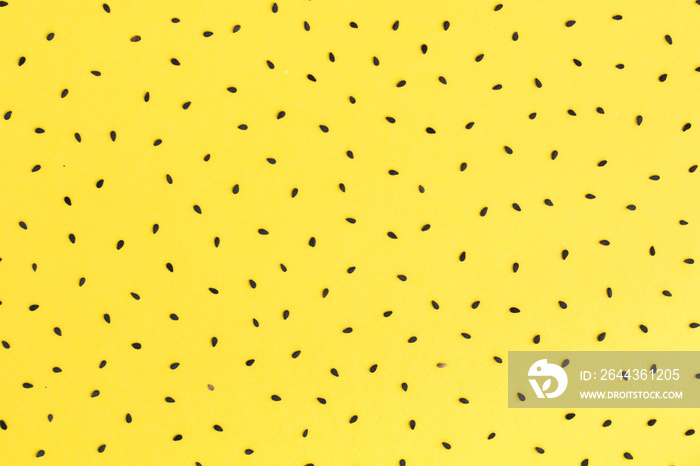 Sesame seeds on yellow background set pattern for food background