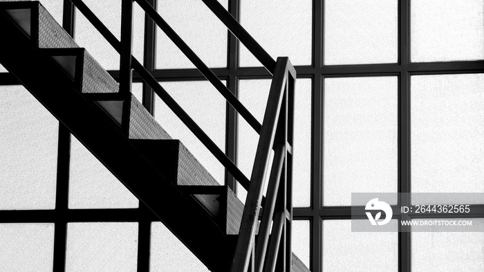 metal staircase near the glass window - close up