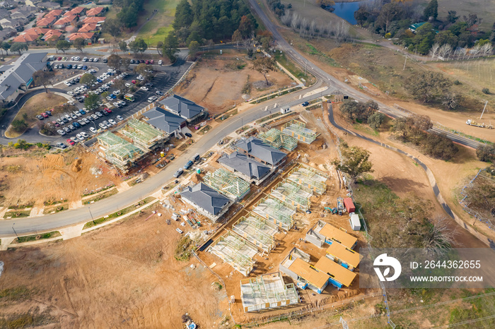 Aerial view of housing development and construction in a newly established suburb in the area of Ginninderry in Canberra, Australia