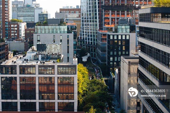 The high line in New York, USA, surrounded by tall buildings