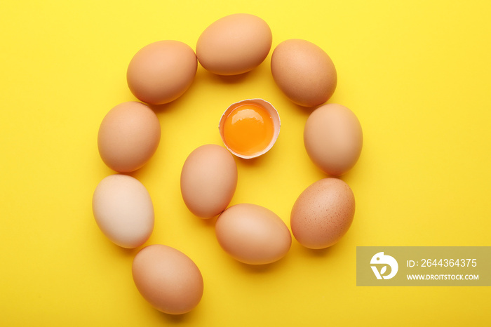 Fresh chicken eggs on color background