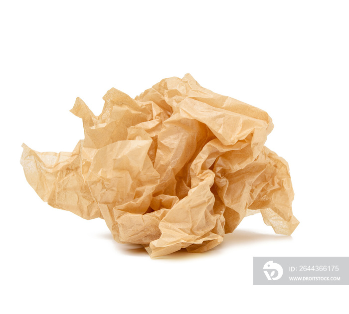 crumpled ball of brown sheet of parchment paper isolated on white background