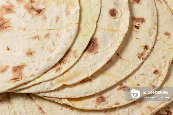 Close up of yellow corn taco shell. texture