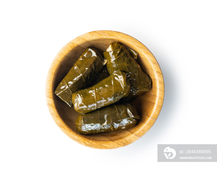 Dolmades. Stuffed vine leaves. Greek appetizer in bowl isolated on white background.