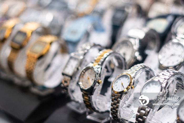 Exhibition of watches behind the window of a watch shop