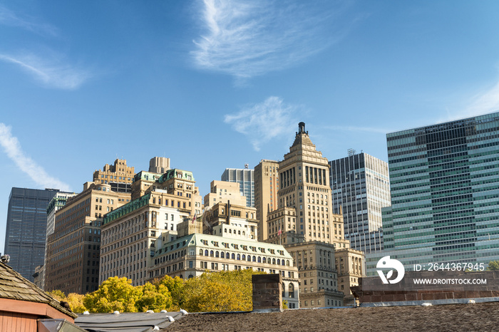 Old and modern skyline of New York City on a sunny autumn day