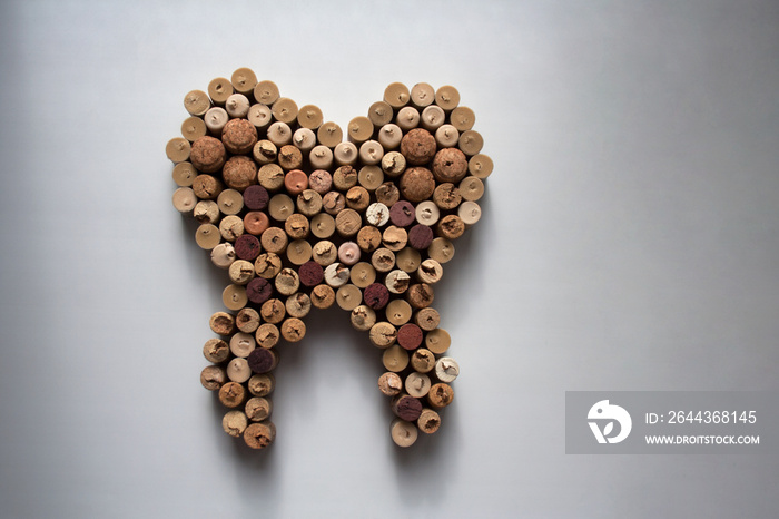 Wine corks tooth abstract composition isolated on white from a high angle view