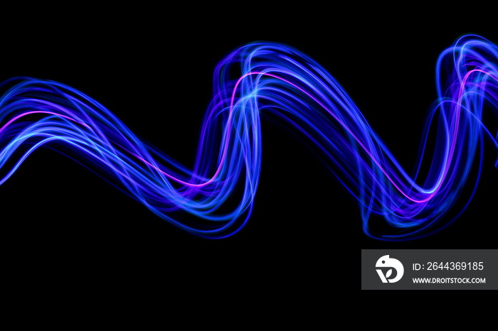 Long exposure photograph of neon blue streaks of light in an abstract swirl, parallel lines pattern against a black background. Light painting photography.