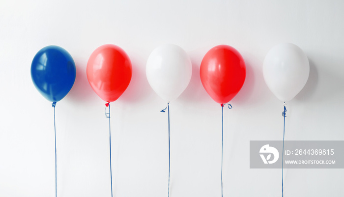 holidays and decorations concept - red, white and blue air balloons for 4th of july or birthday party