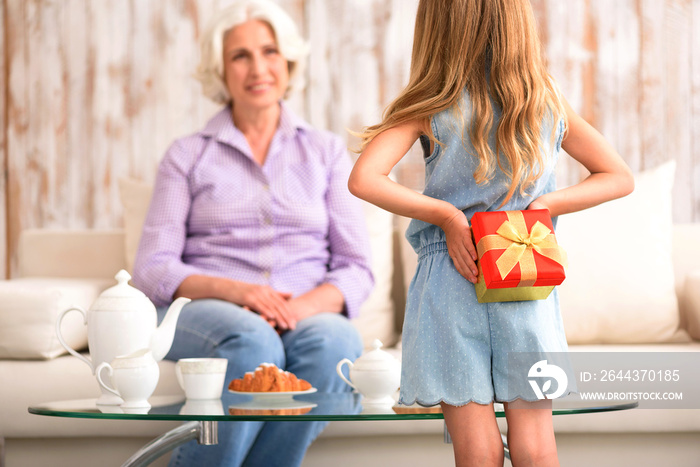 Cute child prepared gift for granny