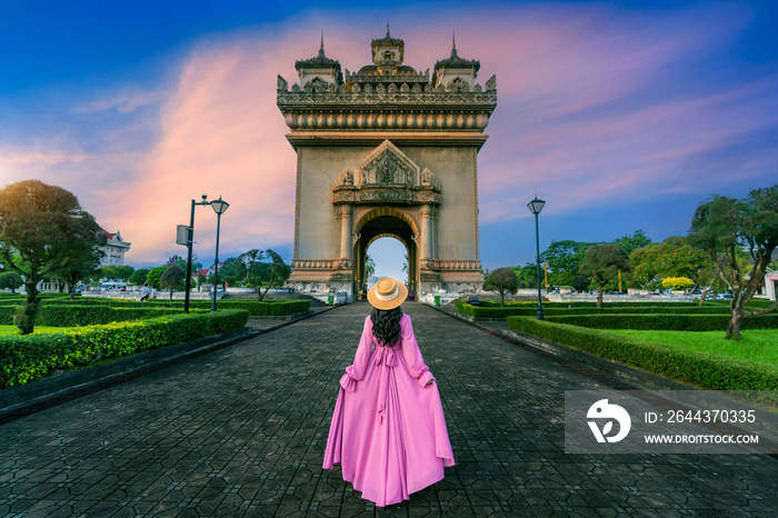 Tourist walking at Patuxai in Vientiane, Laos.