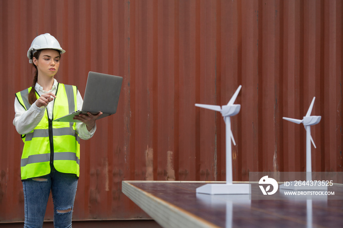 young caucasian woman university student learning and experimental wind and sunlight renewable energy in engineering, bachelor of science, renewable energy course. education and energy concept.