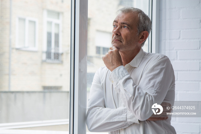 portrait of mature man thinking