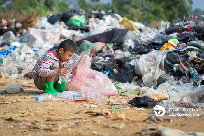 Poor children collect garbage for sale because of poverty, Junk recycle, Child labor, Poverty concept, World Environment Day,