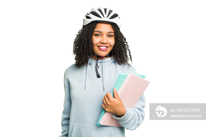 Young african american student woman wearing a helmet bike isolated happy, smiling and cheerful.