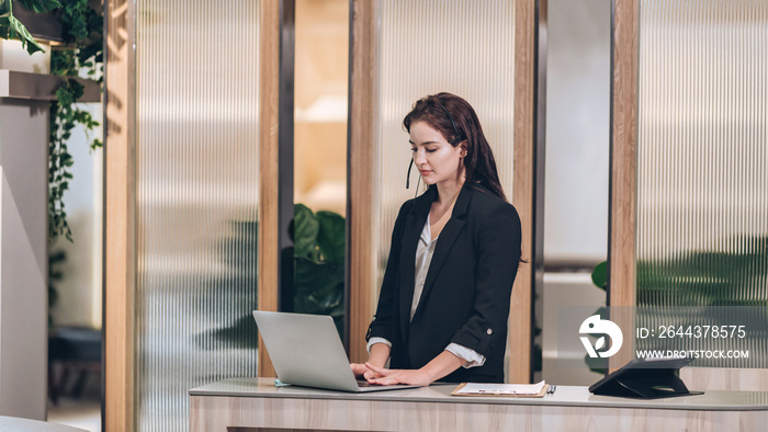 Hotel check in at reception or front office being given key card