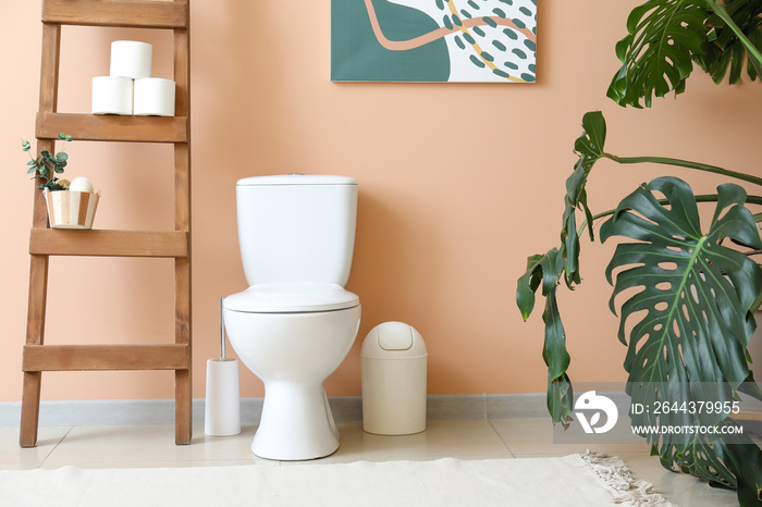 Modern toilet bowl in interior of restroom