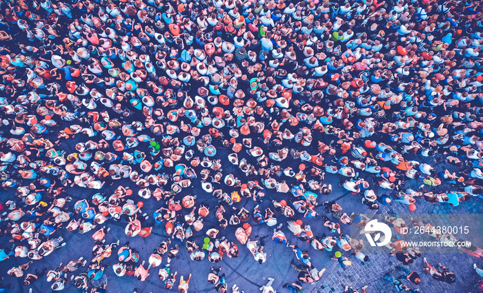 Aerial. People crowd background. Top view. Toned image.