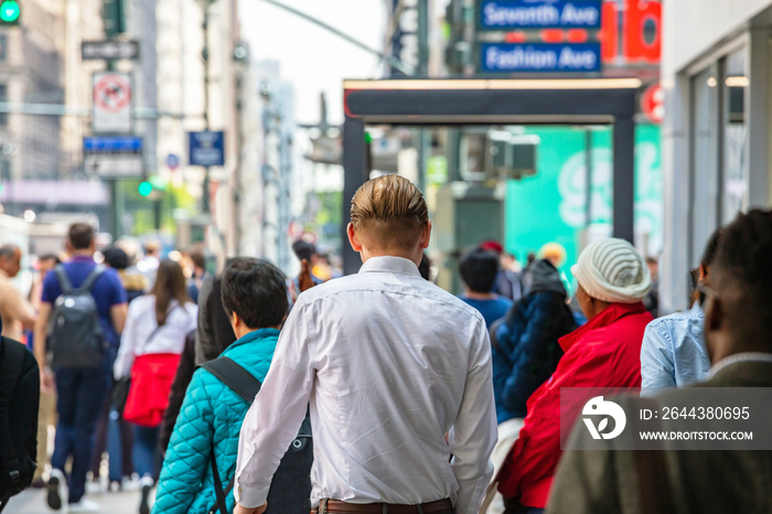 New York, streets. High buildings and crowd walking