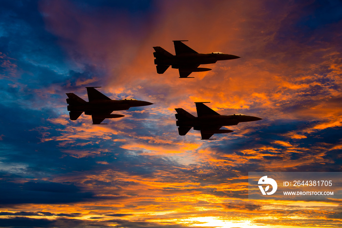 Silhouette army Show performant of air craft in air show with sun sky ocean view at sunset time background.