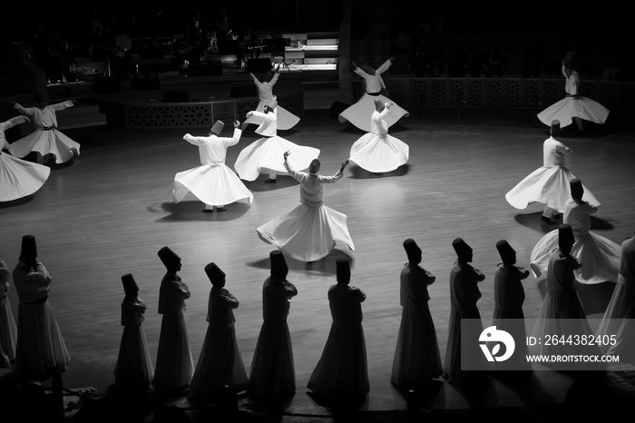 Sufi whirling dervish (Semazen) dances at Mevlana Culture Center. Semazen conveys God’s spiritual gift to those are witnessing the ritual.